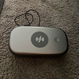 Phone sanitizer and wireless charger